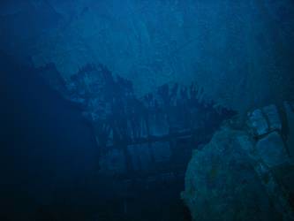 Damage to aft end of inverted bow